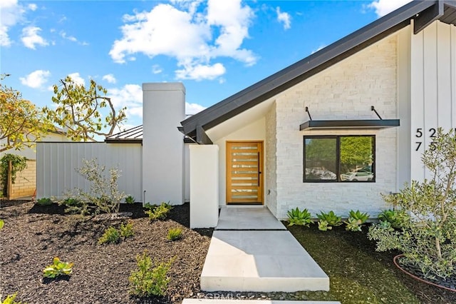 5275 Lynridge Dr, Yorba Linda, CA 92886 - property entrance with stone siding and board and batten siding