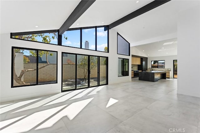5275 Lynridge Dr, Yorba Linda, CA 92886 - unfurnished living room featuring beam ceiling and high vaulted ceiling