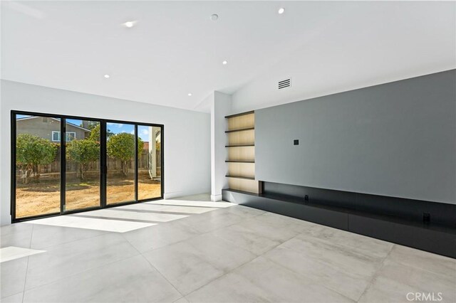 5275 Lynridge Dr, Yorba Linda, CA 92886 - unfurnished room with high vaulted ceiling and recessed lighting
