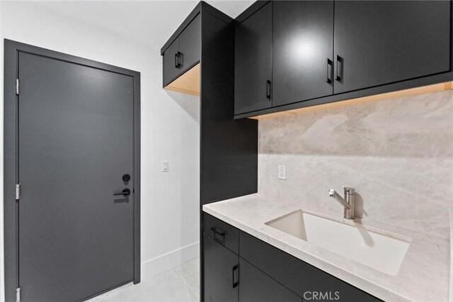 5275 Lynridge Dr, Yorba Linda, CA 92886 - bathroom featuring backsplash, baseboards, and vanity