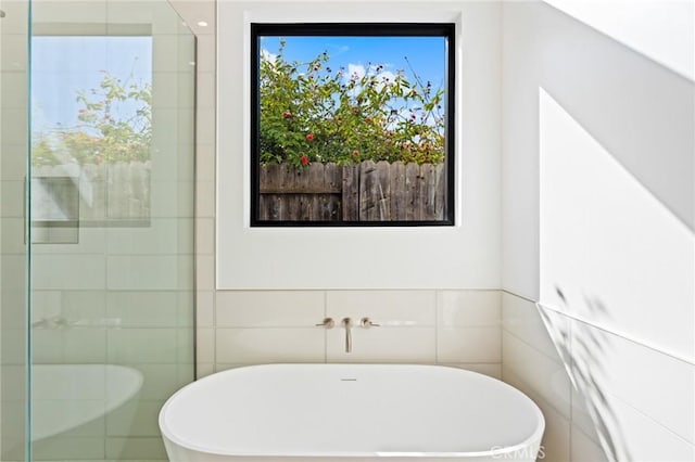 5275 Lynridge Dr, Yorba Linda, CA 92886 - bathroom featuring tile walls, a freestanding bath, and tiled shower