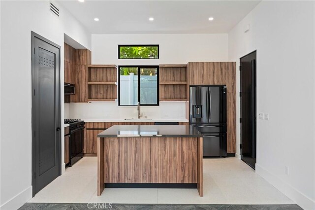 5275 Lynridge Dr, Yorba Linda, CA 92886 - kitchen with black appliances, open shelves, a center island, modern cabinets, and recessed lighting