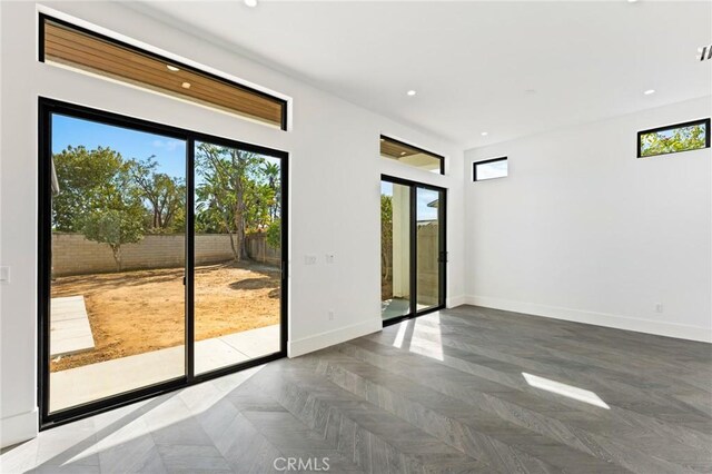 5275 Lynridge Dr, Yorba Linda, CA 92886 - empty room with plenty of natural light, baseboards, and recessed lighting