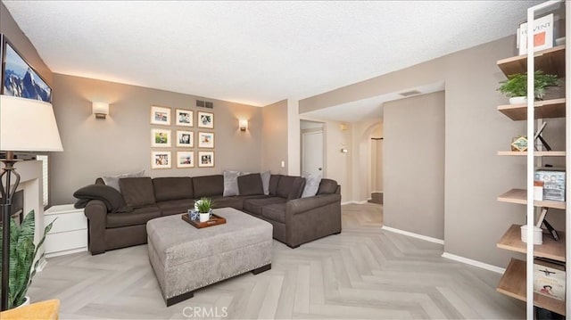 10226 Northridge Dr, Rancho Cucamonga, CA 91737 - living area featuring baseboards and a textured ceiling
