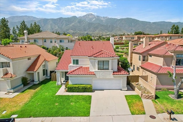 10226 Northridge Dr, Rancho Cucamonga, CA 91737 - mediterranean / spanish-style home with a residential view, a tiled roof, concrete driveway, and stucco siding