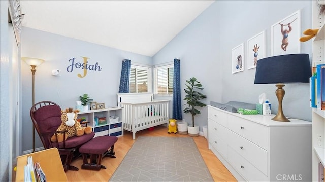 10226 Northridge Dr, Rancho Cucamonga, CA 91737 - bedroom with lofted ceiling and light wood-type flooring