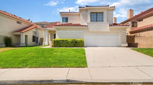 10226 Northridge Dr, Rancho Cucamonga, CA 91737 - mediterranean / spanish house featuring driveway, a garage, stucco siding, and a tiled roof