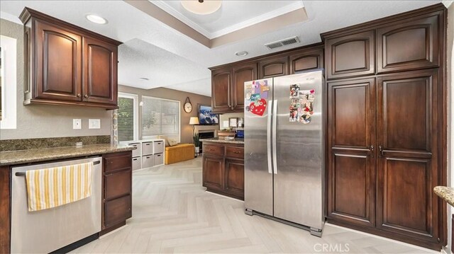 10226 Northridge Dr, Rancho Cucamonga, CA 91737 - kitchen with stainless steel appliances, crown molding, a raised ceiling, dark brown cabinets, and recessed lighting