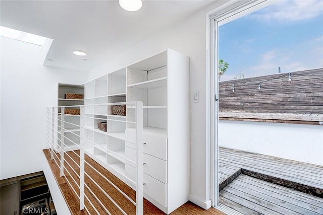 1436 N Detroit St Unit 2, Los Angeles, CA 90046 - walk in closet with wood finished floors and a skylight