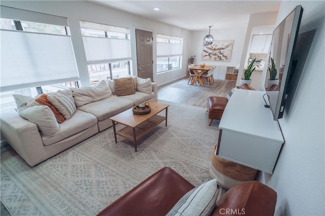 25598 Mont Pointe Unit 4E, Lake Forest, CA 92630 - living room featuring wood finished floors, a chandelier, and recessed lighting