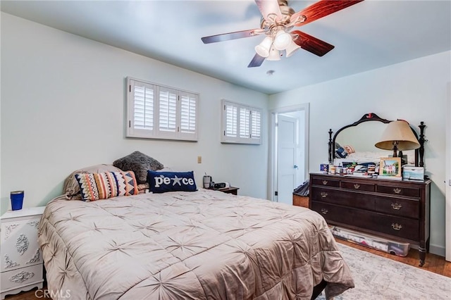 12438 Lambert Cir, Garden Grove, CA 92841 - bedroom with wood finished floors and a ceiling fan