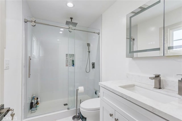 12438 Lambert Cir, Garden Grove, CA 92841 - bathroom with vanity, toilet, a stall shower, and recessed lighting