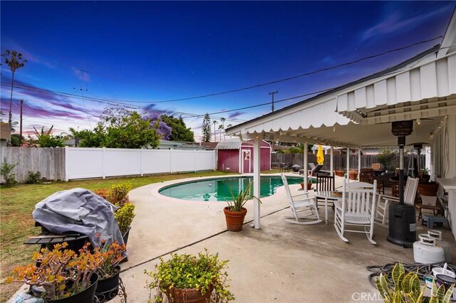 12438 Lambert Cir, Garden Grove, CA 92841 - view of swimming pool with a patio area and a fenced backyard