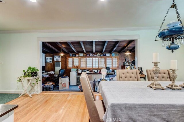 12438 Lambert Cir, Garden Grove, CA 92841 - dining space with wood finished floors, baseboards, wood ceiling with exposed beams, and crown molding