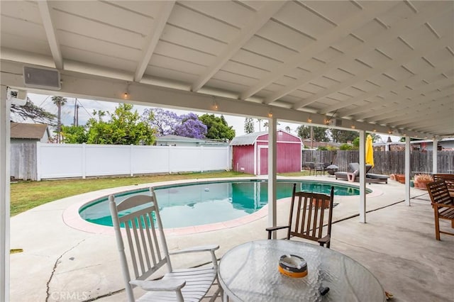 12438 Lambert Cir, Garden Grove, CA 92841 - view of swimming pool with a patio area, a fenced backyard, and outdoor dining space