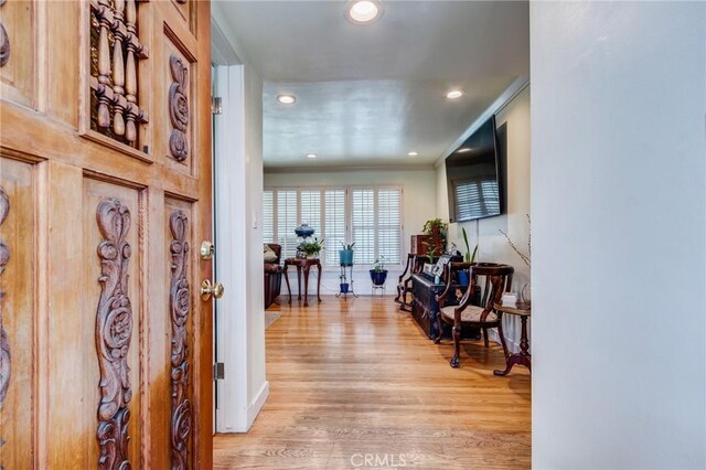12438 Lambert Cir, Garden Grove, CA 92841 - hall featuring light wood-type flooring, recessed lighting, and ornamental molding