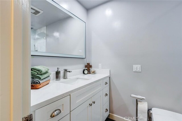 12438 Lambert Cir, Garden Grove, CA 92841 - bathroom with vanity and toilet