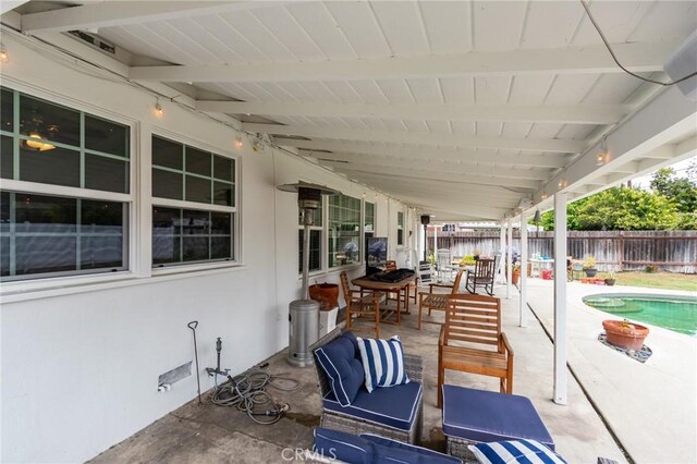 12438 Lambert Cir, Garden Grove, CA 92841 - fenced backyard with a patio area, an outdoor hangout area, and outdoor dining space