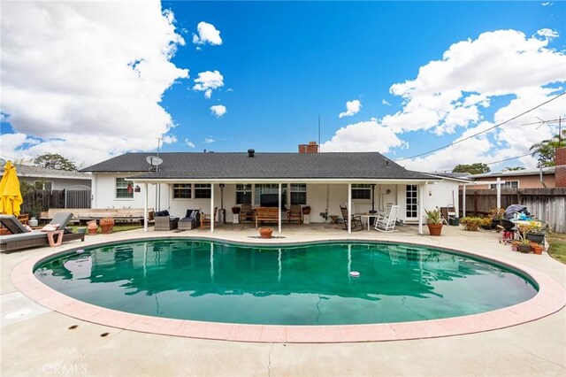 12438 Lambert Cir, Garden Grove, CA 92841 - view of swimming pool with an outdoor hangout area and a patio