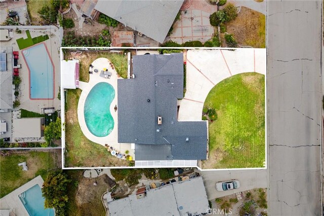 12438 Lambert Cir, Garden Grove, CA 92841 - aerial view of property and surrounding area featuring a pool area and property boundaries highlighted