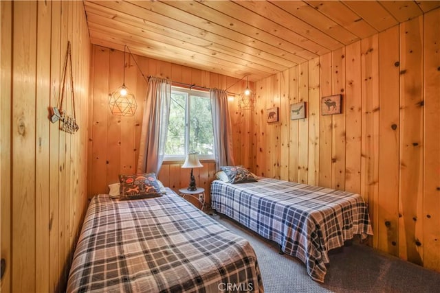 26503 Amador Ln, Lake Arrowhead, CA 92352 - carpeted bedroom with wood ceiling and wooden walls