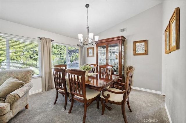 6752 Laurelbrook Dr, Riverside, CA 92506 - dining area featuring a chandelier, lofted ceiling, and light carpet