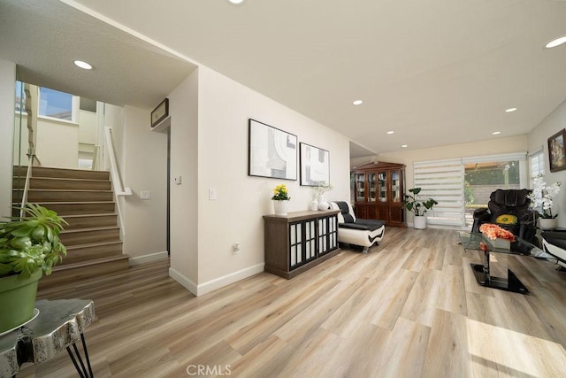 6678 Wrangler Rd, Chino Hills, CA 91709 - hall with light wood-type flooring, recessed lighting, and stairway