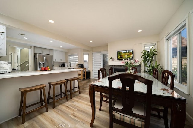 6678 Wrangler Rd, Chino Hills, CA 91709 - dining room featuring light wood-style floors and recessed lighting