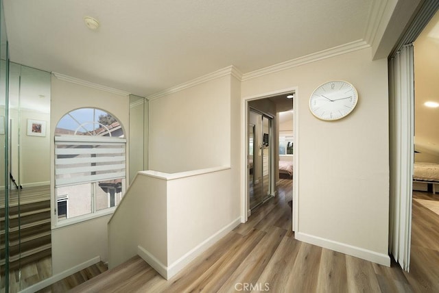 6678 Wrangler Rd, Chino Hills, CA 91709 - hall featuring an upstairs landing, wood finished floors, and crown molding