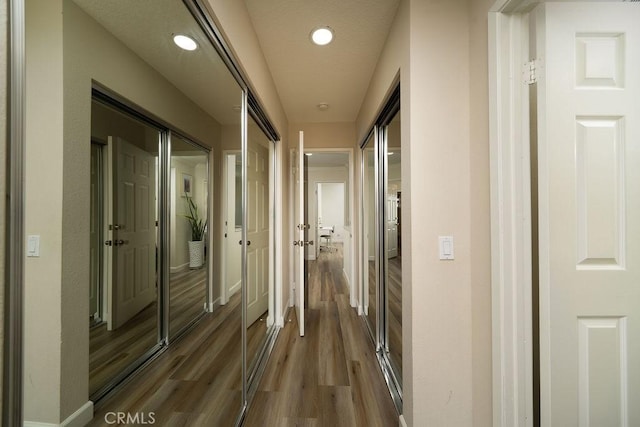 6678 Wrangler Rd, Chino Hills, CA 91709 - hallway with wood finished floors and recessed lighting