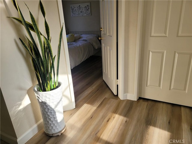 6678 Wrangler Rd, Chino Hills, CA 91709 - corridor featuring light wood finished floors and baseboards