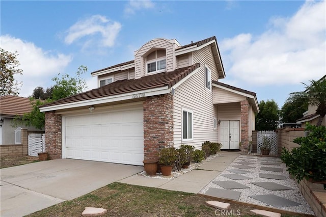 6678 Wrangler Rd, Chino Hills, CA 91709 - view of front of property featuring a garage, concrete driveway, brick siding, and a tile roof