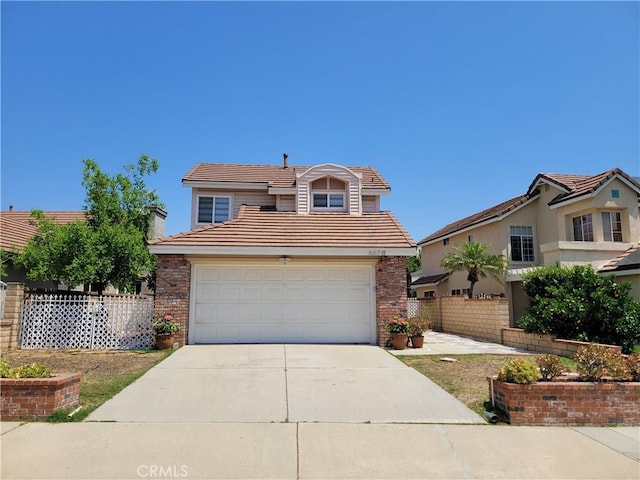 6678 Wrangler Rd, Chino Hills, CA 91709 - traditional-style home featuring a tiled roof, a garage, and concrete driveway