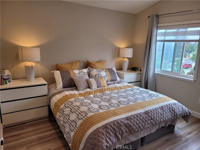 6678 Wrangler Rd, Chino Hills, CA 91709 - bedroom featuring wood finished floors and baseboards