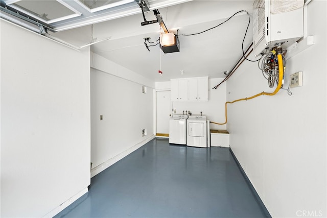 601 San Nicholas Ct Unit 601, Laguna Beach, CA 92651 - garage featuring washer and clothes dryer and a garage door opener