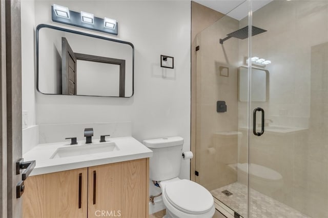 11240 Lull St, Sun Valley, CA 91352 - bathroom featuring toilet, vanity, and a shower stall