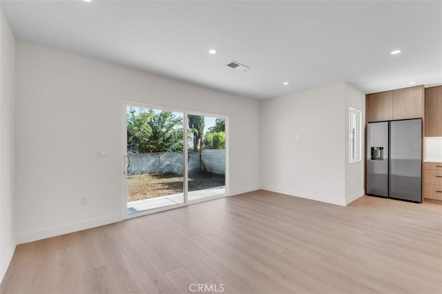 11240 Lull St, Sun Valley, CA 91352 - unfurnished room featuring light wood finished floors, recessed lighting, and baseboards