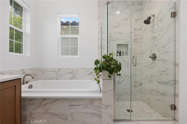 1146 E Cove Pl, Encinitas, CA 92024 - bathroom with a garden tub, a marble finish shower, vanity, and plenty of natural light