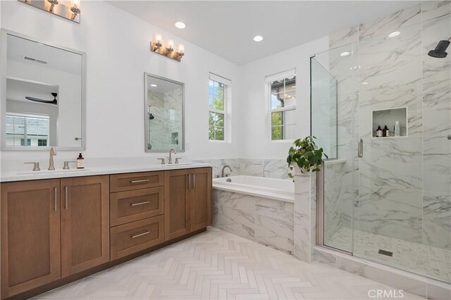 1146 E Cove Pl, Encinitas, CA 92024 - bathroom with a garden tub, a marble finish shower, double vanity, and recessed lighting