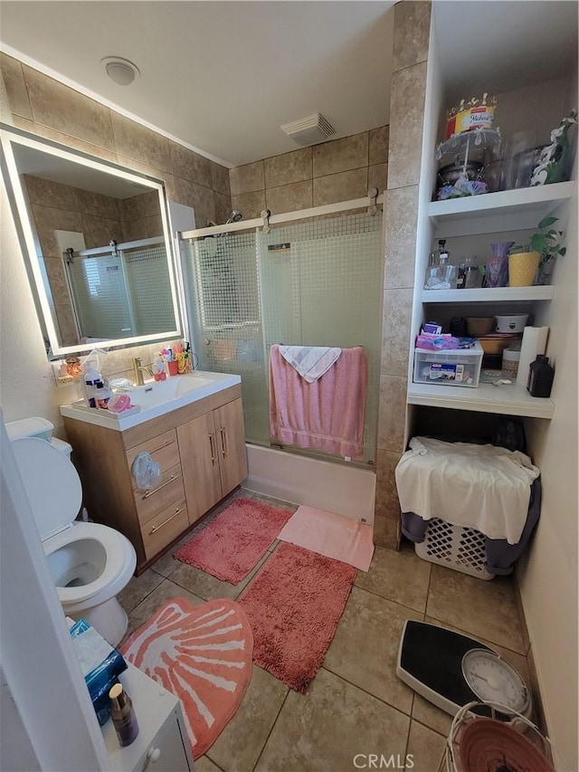 7571 San Rafael Dr E, Buena Park, CA 90620 - full bathroom featuring toilet, tile patterned flooring, and vanity