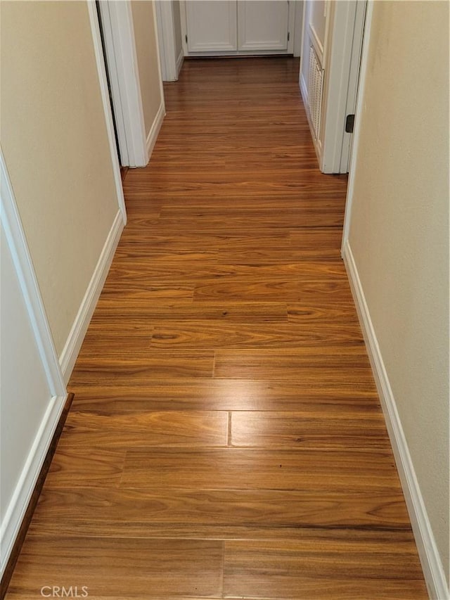 7571 San Rafael Dr E, Buena Park, CA 90620 - hall featuring wood finished floors and baseboards
