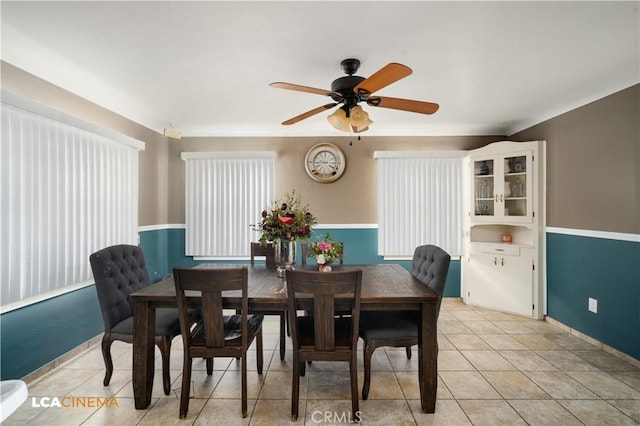 13271 Garzoli Ave, Mcfarland, CA 93250 - dining room with a ceiling fan, light tile patterned floors, and baseboards