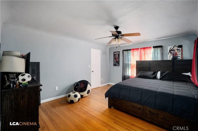 13271 Garzoli Ave, Mcfarland, CA 93250 - bedroom with light wood-style floors, baseboards, and ceiling fan