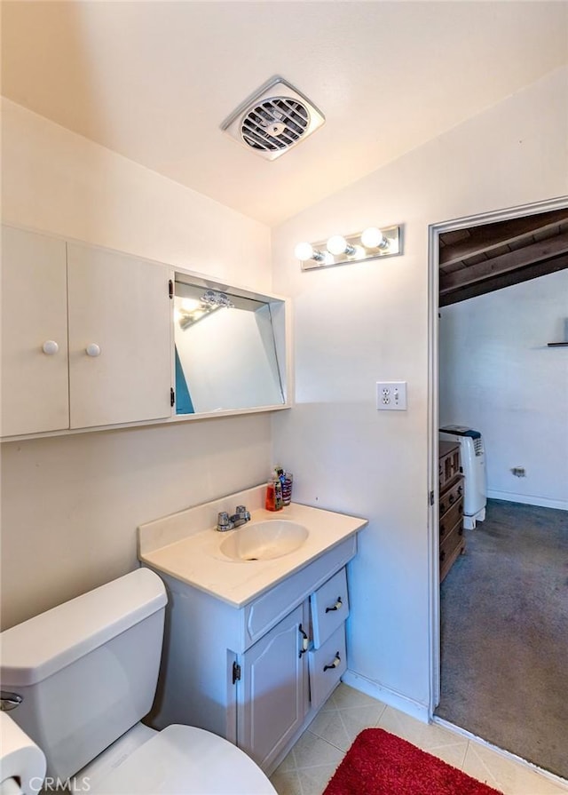 14124 Fonseca Ave, La Mirada, CA 90638 - bathroom with vanity, toilet, and tile patterned floors