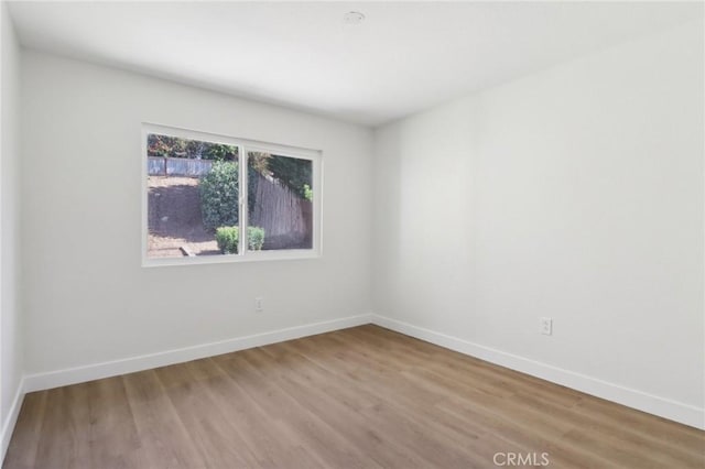 4708 Sunrise Rdg, Oceanside, CA 92056 - spare room with wood finished floors and baseboards