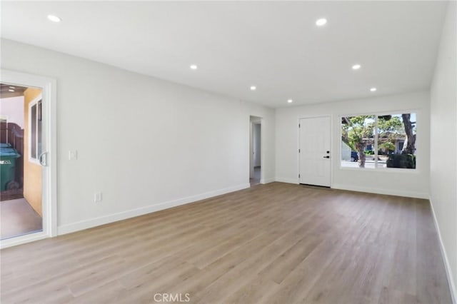 4708 Sunrise Rdg, Oceanside, CA 92056 - unfurnished living room with recessed lighting, wood finished floors, and baseboards