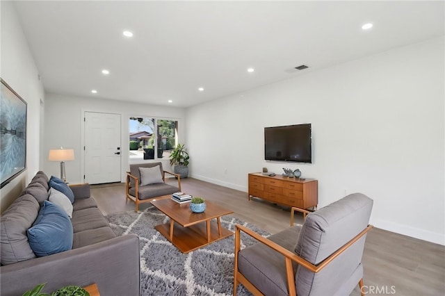 4708 Sunrise Rdg, Oceanside, CA 92056 - living room with wood finished floors, recessed lighting, and baseboards