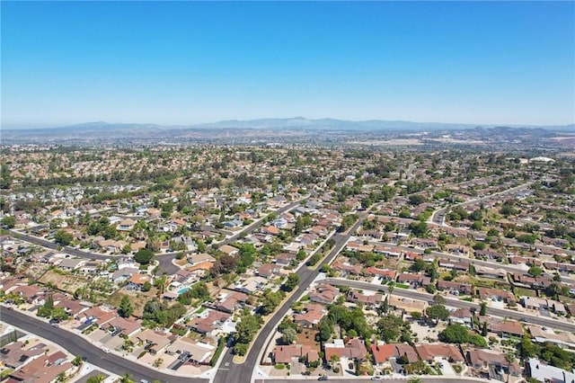 4708 Sunrise Rdg, Oceanside, CA 92056 - aerial overview of property's location featuring a mountainous background and nearby suburban area