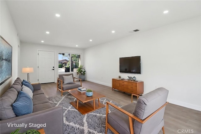 4708 Sunrise Rdg, Oceanside, CA 92056 - living room featuring recessed lighting, wood finished floors, and baseboards