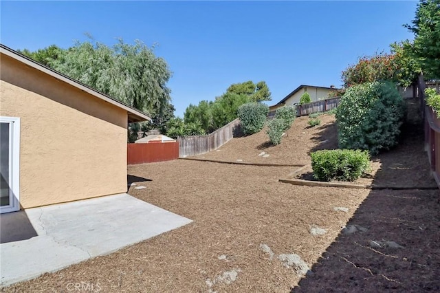 4708 Sunrise Rdg, Oceanside, CA 92056 - fenced backyard with a patio area